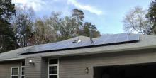 solar panel installation on residential grey roof